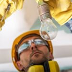 electrician checking cables in a lighting system t y4jekzq 1 (1)